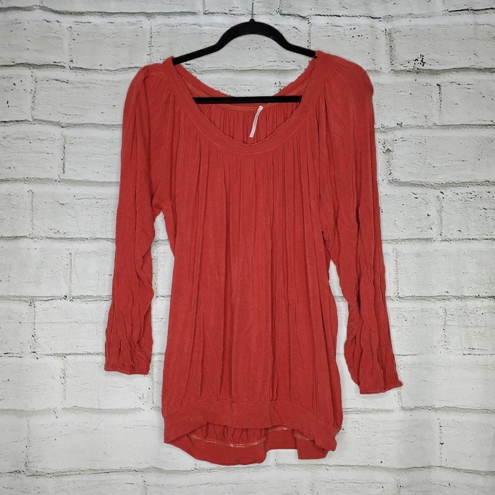 Free people over sized orange long sleeve Rayon top medium